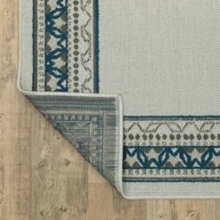 Trinity Classic Border Patio Area Rug Beige/Blue - Captiv8e Designs -Home Textiles Store GUEST 13dc7fa9 bab9 4f9f a2d2 902a535f37d0